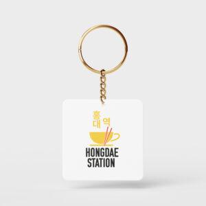 Porte clé avec le logo du café Hongdae Station