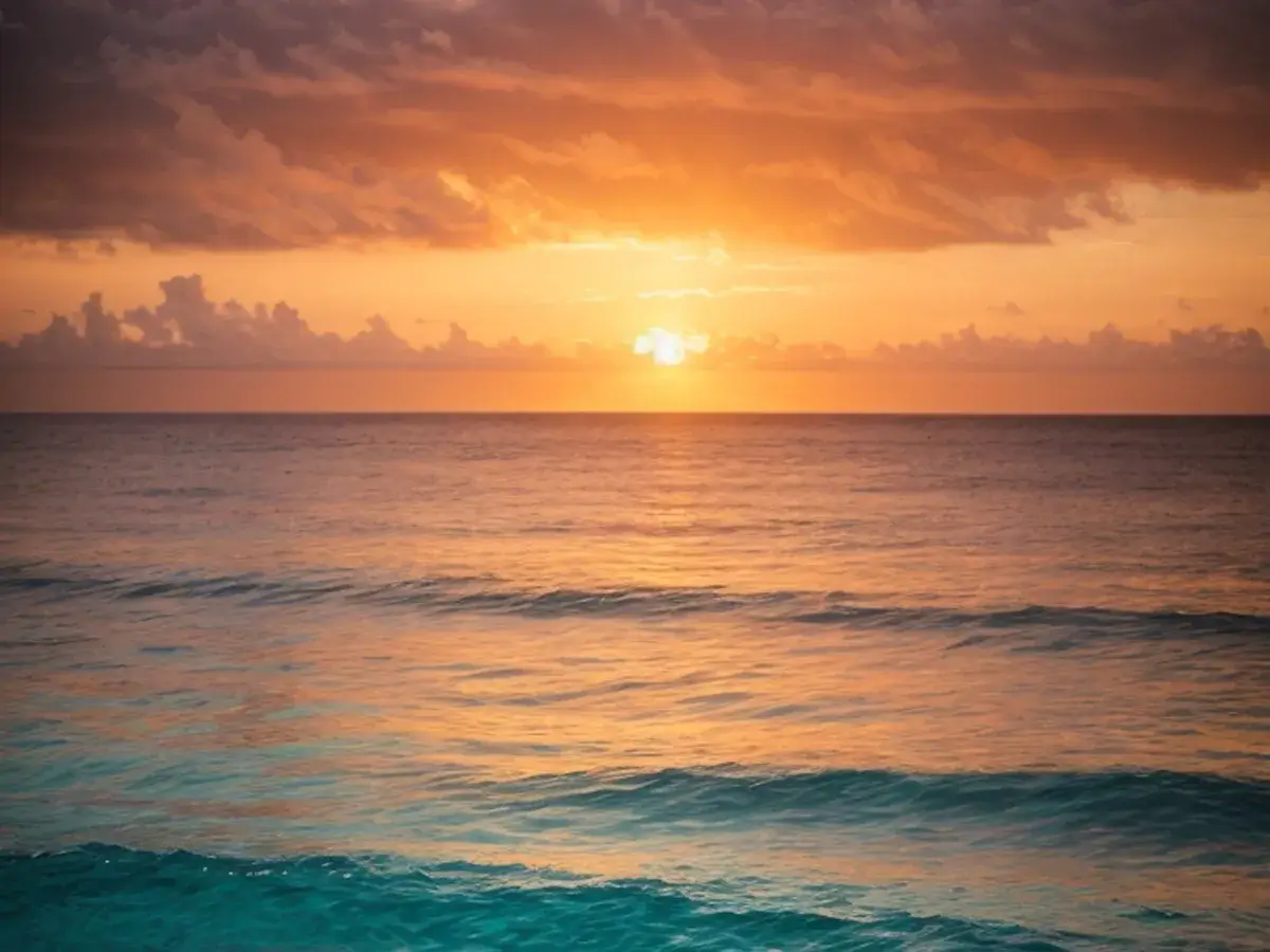 Coucher de soleil face à la mer depuis la plage privée La Casa Boho