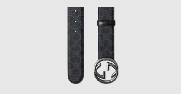 Ceinture Gucci 12 a motif noir et blanc, avec fermoir gris gros logo