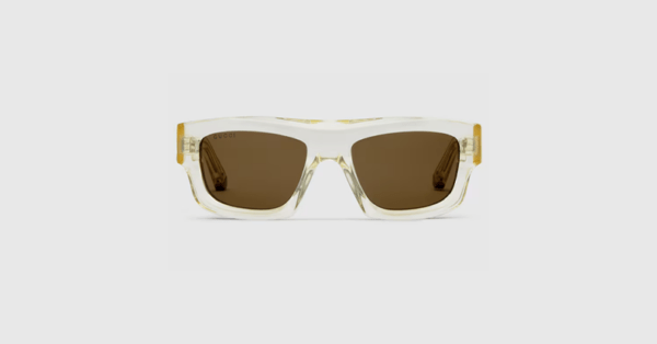lunettes de la marque gucci, couleur blanche et doré, collection été 2025